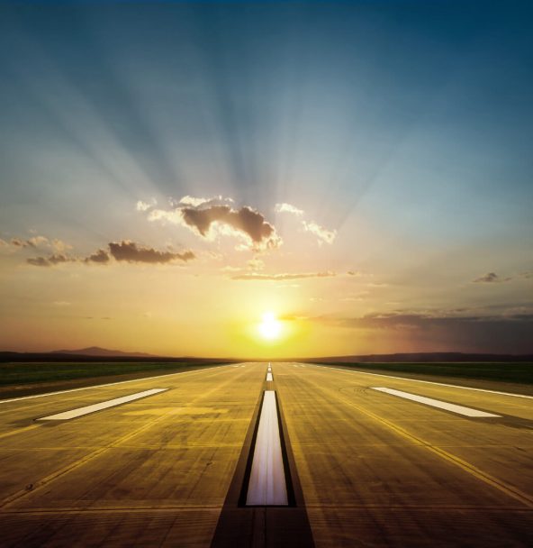 Grafik mit Landebahn bei Sonnenuntergang symbolisiert AWS-Landezone der PCG