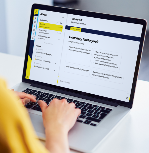 AIHub: the AI Building Block for Your Company on screen of a female data scientist