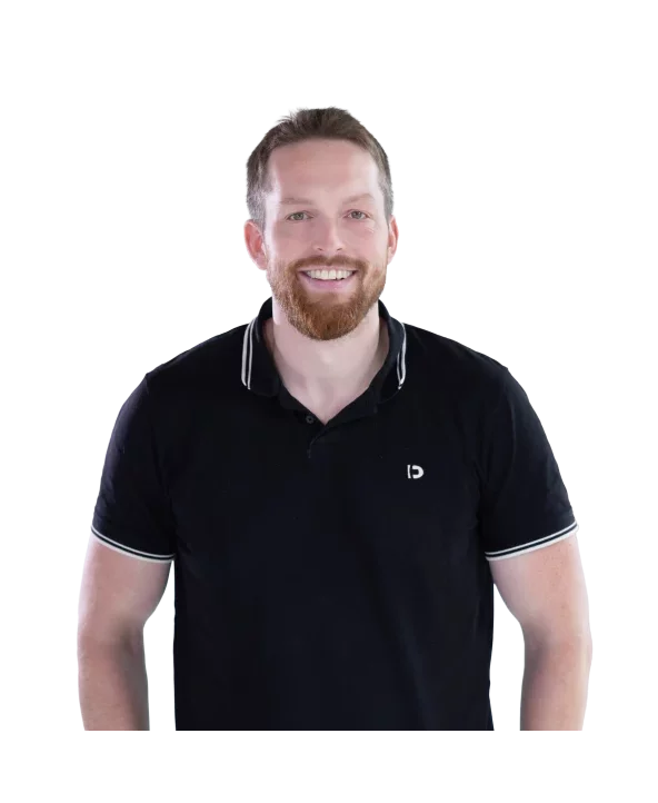 Portrait of Philipp Müller wearing a black polo shirt against a white background.