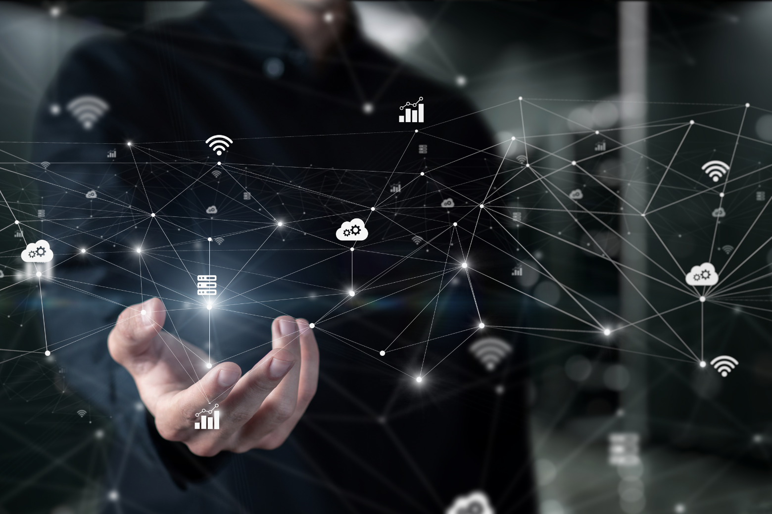 Hand holding dark glowing network with data symbols.
