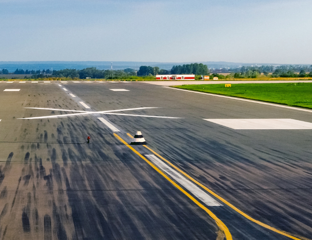 The image shows an runway. The Public Cloud Group (PCG) helps companies take off into the cloud with AWS.