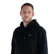 Portrait of Philipp Richter, showing him in professional attire with a neutral background.