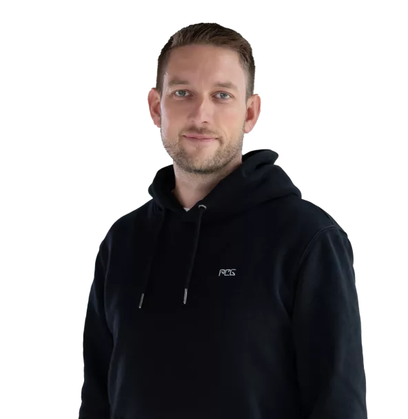 Portrait of Philipp Richter, showing him in professional attire with a neutral background.