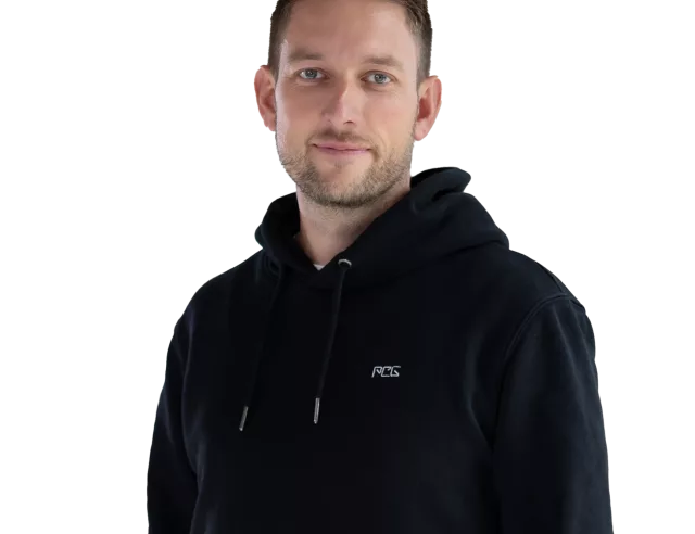 Porträt von Philipp Richter, Leiter der SAP Business Unit, in professioneller Kleidung vor neutralem Hintergrund.