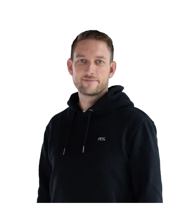 Portrait of Philipp Richter, showing him in professional attire with a neutral background.