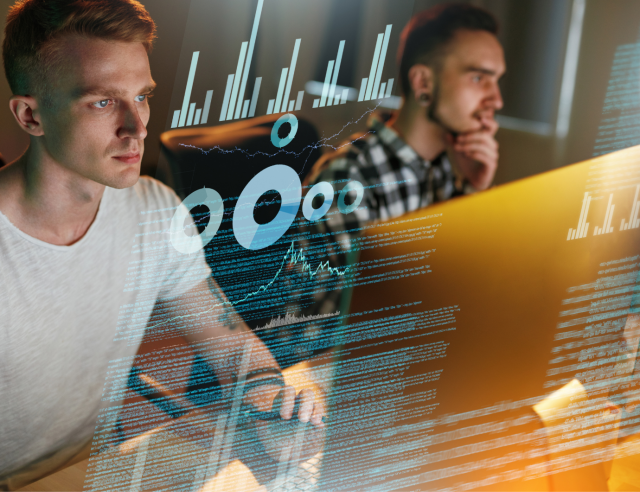 Two people working on their computers and there is transparent Data in the front