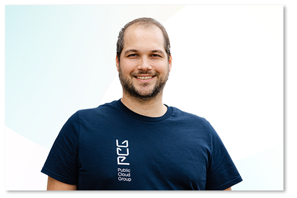Smiling portrait of Jannick Loschen against white background.