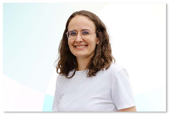 Professional portrait of Linda Hildenbrand wearing a white t-shirt.